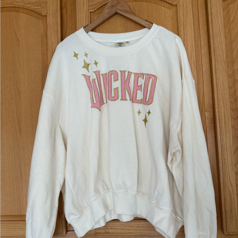 Universal Cream Sweater with Pink 'Wicked' Design